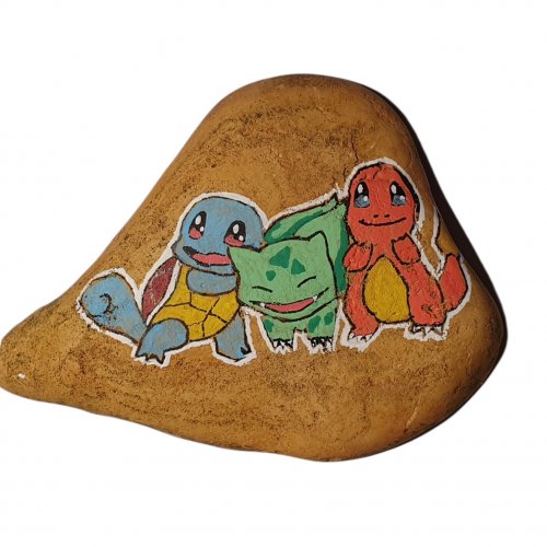 Charmander, Squirtle and Bulbasaur on rock