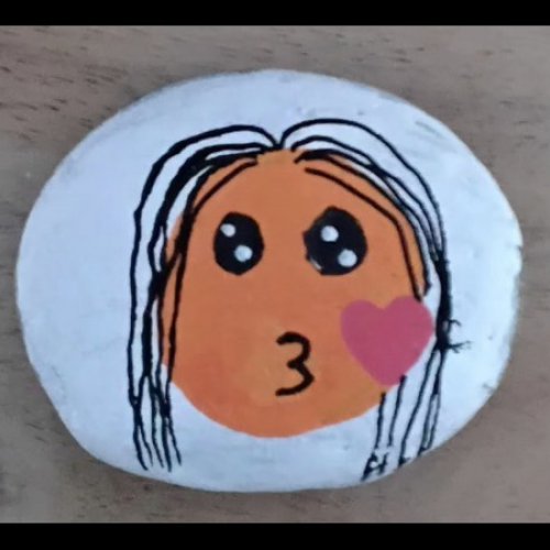 Deden Emojie orange avec des cheveux