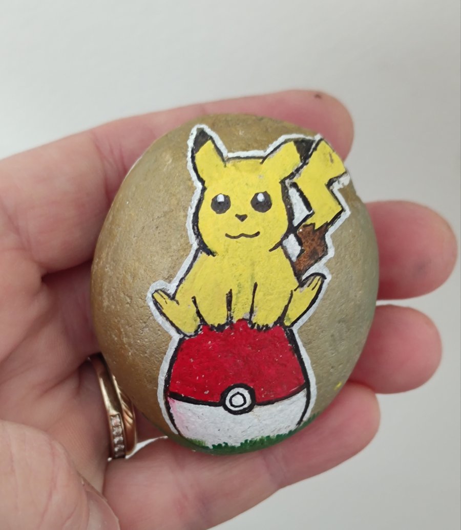 Pokemon rocks Pikachu and a egg-pokeball : 1708874691.img.20240225.162237.jpg